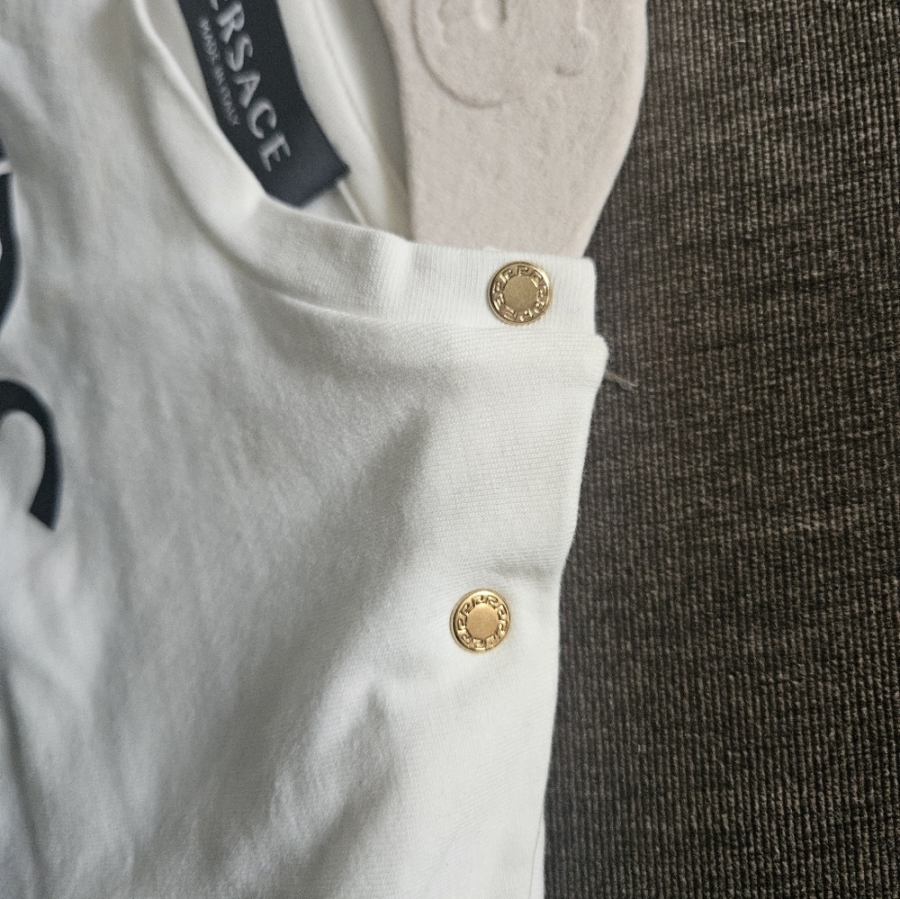 Versace Kids Tee in White with Bold Logo Small Yellowish Stain In Front. - Picture 12 of 13